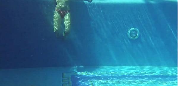  Kittina swims naked in the swimming pool